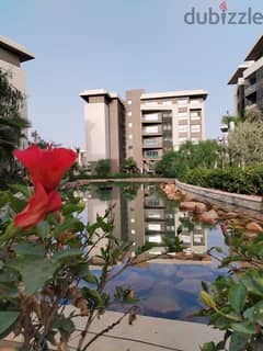 Apartment for sale in Privado, Madinaty, on the most beautiful lakes of the compound, ground floor, high-rise neighbor, directly on the ocean, area 13