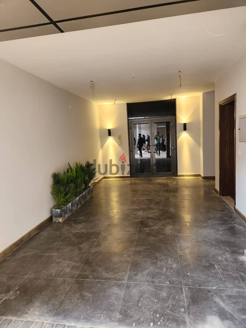 Apartment for sale open view 185 meters + terrace 34 meters, fully finished + AC and kitchen, with 10% down payment, Zed Towers Sheikh Zayed 11