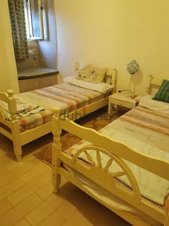wooden beds 2 with mattress 0
