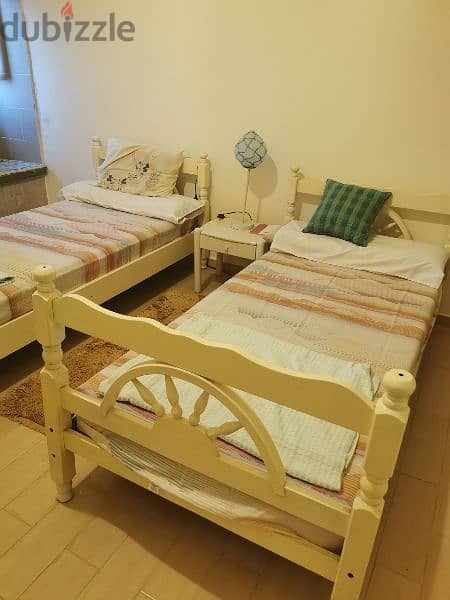 wooden beds 2 with mattress 1