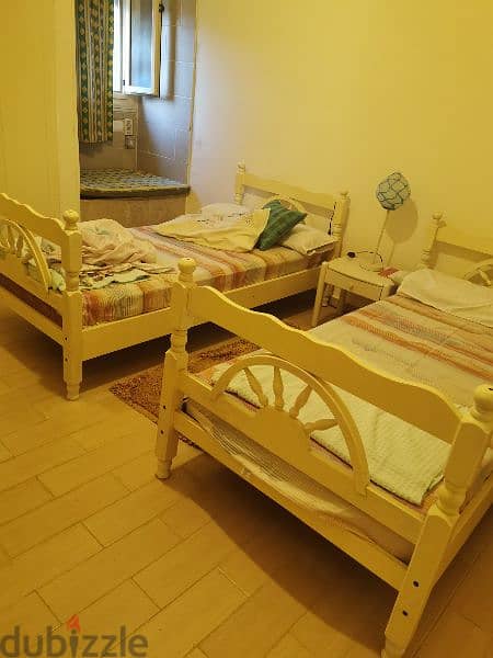 wooden beds 2 with mattress 4