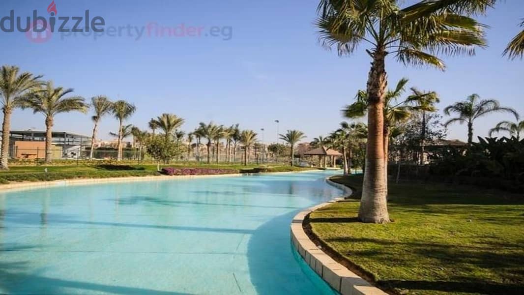 Twin house villa for sale in Swan Lake Hassan Allam Compound, directly in front of Al-Rehab 2