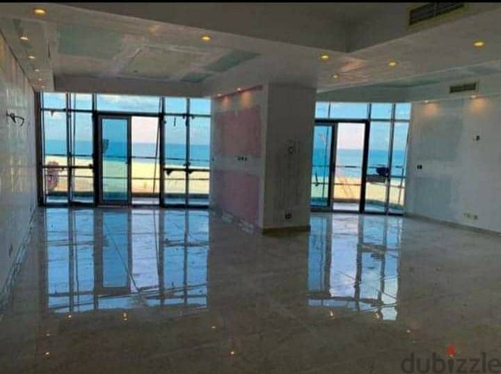 Apartment for sale in Double View Lagoon and Sea, fully finished, in New Alamein Towers 1