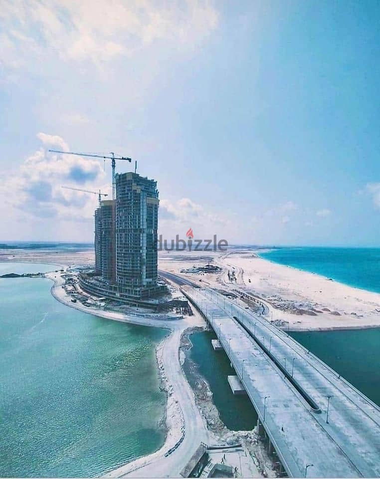 Apartment for sale in Double View Lagoon and Sea, fully finished, in New Alamein Towers 7