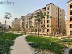 Apartment with a garden for sale crystal lagoon view on Mostakbal City | Sarai | MNHD in front of New Heliopolis beside Madinaty 0