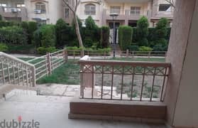 Apartment for rent in Madinaty, the first ground floor residence with a private garden, directly in front of services, a very special location, with a 0