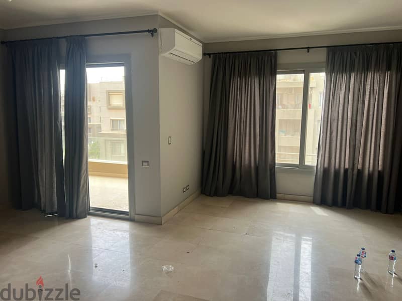semi furnished apartment 2 bedrooms with AC's and kitchen with appliances - steps away from point 90 mall and the AUC 0