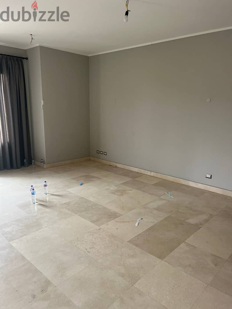 semi furnished apartment 2 bedrooms with AC's and kitchen with appliances - steps away from point 90 mall and the AUC 6