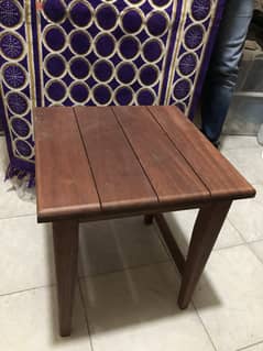 Rectangular outdoor wooden table