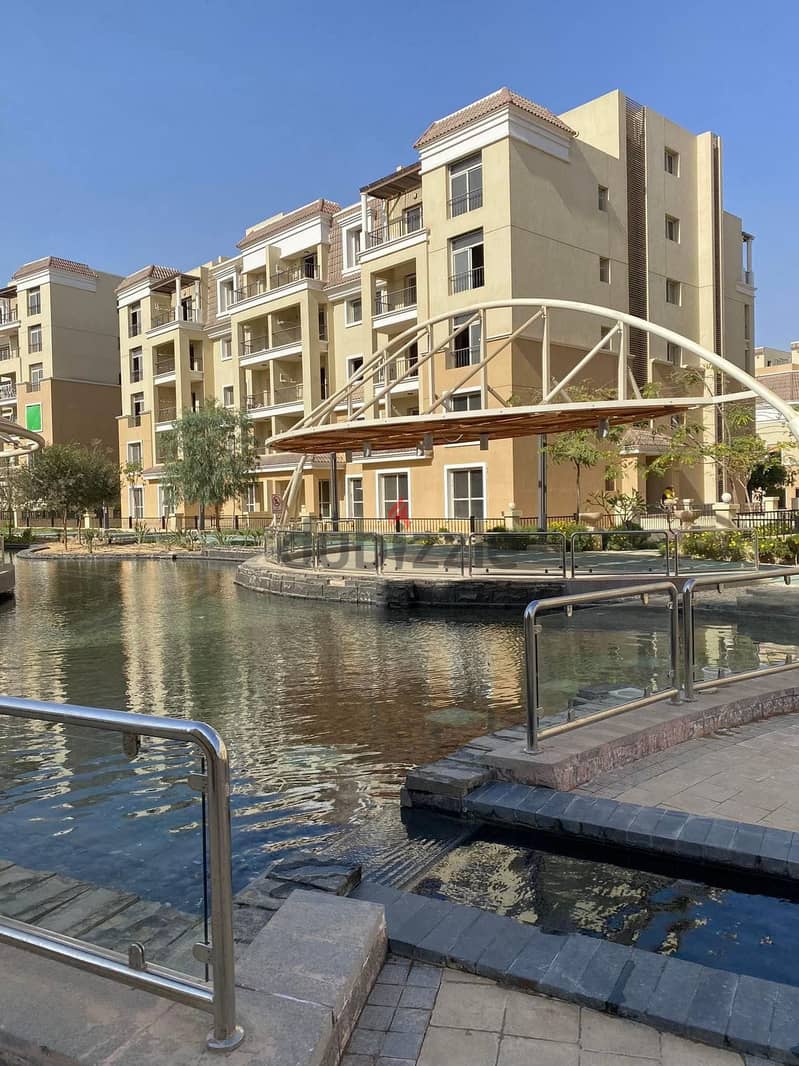 Apartment 131 meters ((3 rooms)) with a garden of 169 meters for sale in Sarai Compound, New Cairo, in a great location, next to Madinaty and Shorouk, 1
