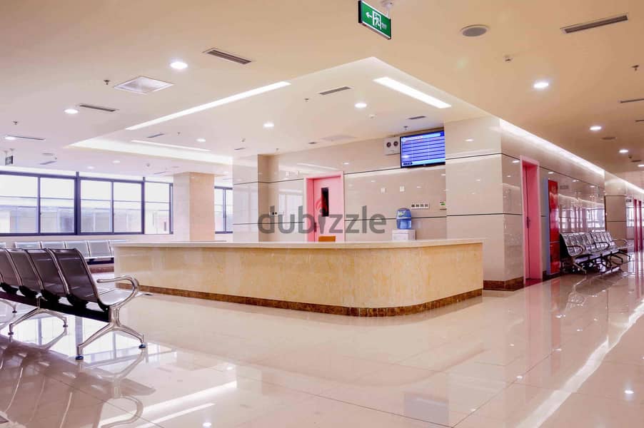 A dual clinic in the largest hospital with an area of 13,000 square meters in the middle of the largest residential density of more than 40 compounds 6
