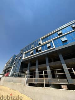 محل تجاري 91 متر أرضي للبيع في مول ديونز الشيخ زايد على شارع رئيسي أمام المدرسه الامريكية 0