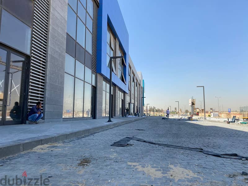 Office for sale ready to move with instalments for the longest period, on Egypt Alexandria Desert Road directly near to Smart Village 1