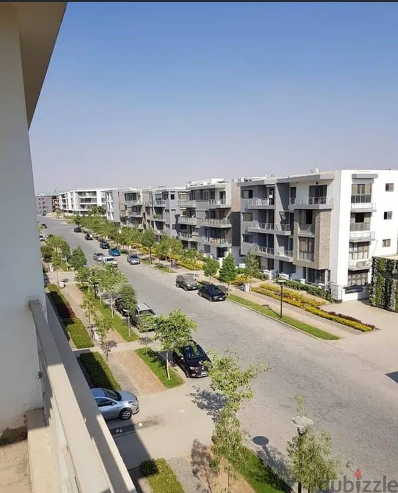 Apartment for sale two rooms in installments in Taj City Compound in front of Cairo Airport 1