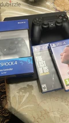 ps4 + 2controllers + fifa22 + the last of us 0