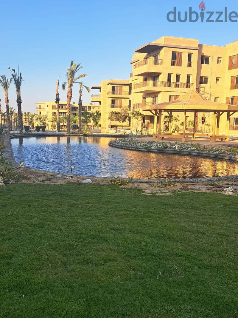 Duplex on view, 163m for sale in Taj City Compound, in front of Cairo Airport, landscape view 16