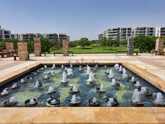 Double view apartment in Taj City Compound, area of 166 square meters, for sale at a special price, view pool, in front of Cairo Airport 0