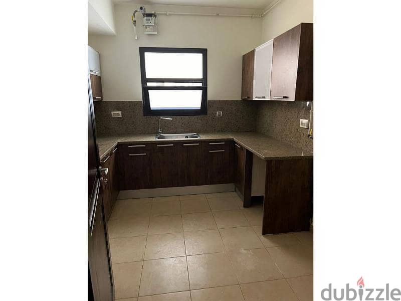 Apartment for rent in mivida Kitchen & Acs super lux 13