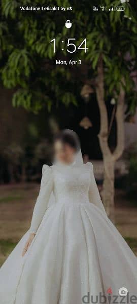 فستان زفاف للبيع لبسه واحده بوكيه ورد جديد 2