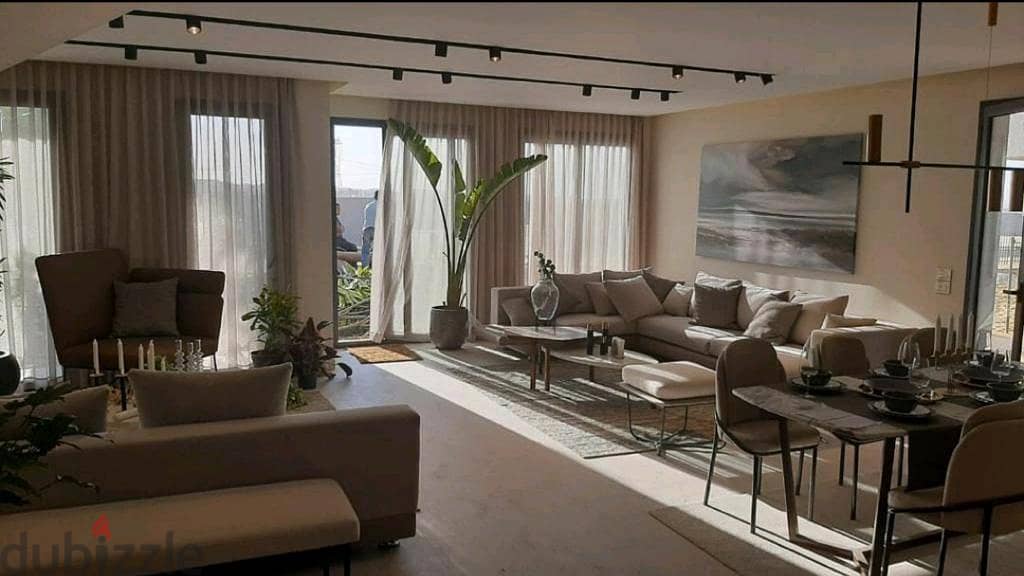 2 bedroom apartment for sale fully finished ultra-modern in | Sodic East | Shorouk Heliopolis with a wonderful landscape view and a swimming pool 9