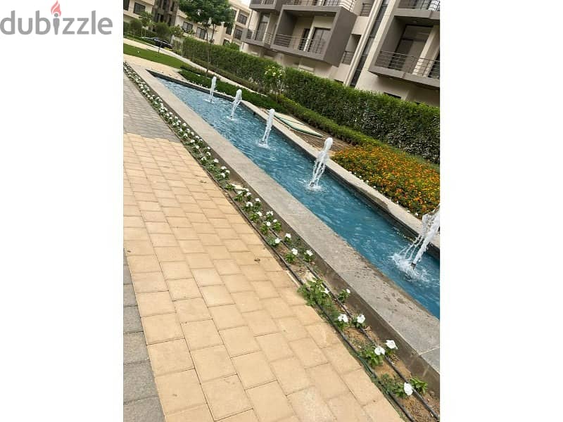The lowest down payment for apartment 138m with roof 71m fully finished view pocket landscape in compound al marasem fifth square 5