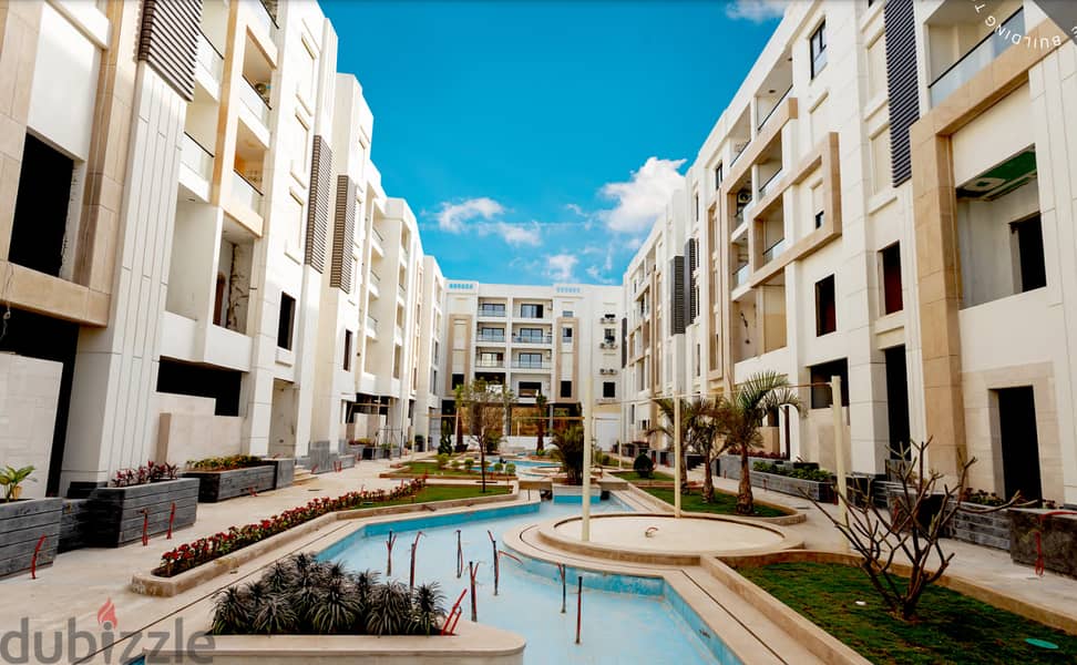 Apartment for sale, fully finished, 3 rooms, with air conditioners, next to Al-Futtaim Mall and the airport 1
