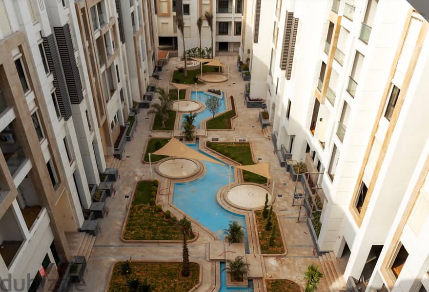 Apartment for sale, fully finished, 3 rooms, with air conditioners, next to Al-Futtaim Mall and the airport 2