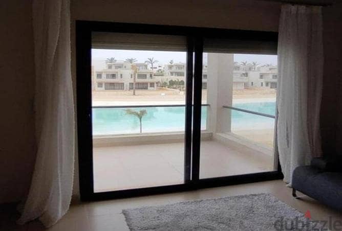 chalet for sale in azha north coast finished with kitchen +AC's - sea view  in  first row on the largest crystal lagoon in Ras el hekma Investment are 1