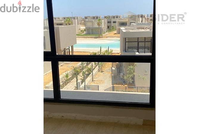 chalet for sale in azha north coast finished with kitchen +AC's - sea view  in  first row on the largest crystal lagoon in Ras el hekma Investment are 5