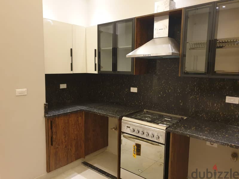 Apartment 146. M in Palm Hills Village Gate fully finished with kitchen and appliances under market price 3