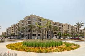شقة للبيع بكمبوند ميفيدا موقع متميز جدا تطل على شارع البوليفارد و ليك Mivida New Cairo 8