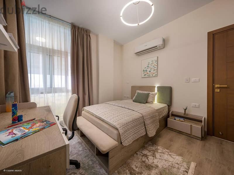Apartment 107 meters, two rooms, with a 20% discount and payment up to 8 years, in the Fifth Settlement, in front of Hyde Park 7