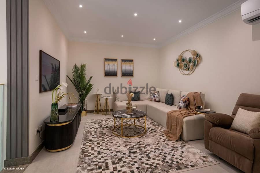 Apartment 107 meters, two rooms, with a 20% discount and payment up to 8 years, in the Fifth Settlement, in front of Hyde Park 8