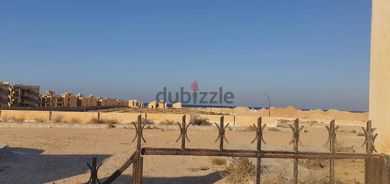 Land for sale in the most beautiful beaches of the world, Marsa Matrouh city, first row to the sea, an area of ​​12 acres, on which 22 villas are buil 12