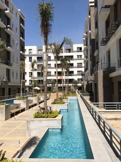 Very special location in front of Cairo Airport, 9 minutes to the community, 137 sqm apartment on direct view + 100 sqm garden for sale in Taj City Co 0