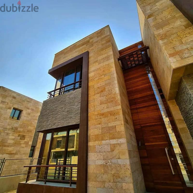 with 70% off on payments system installments on 8 years  own townhouse villa for sale in new cairo , open view on large park , villas only  corner 3