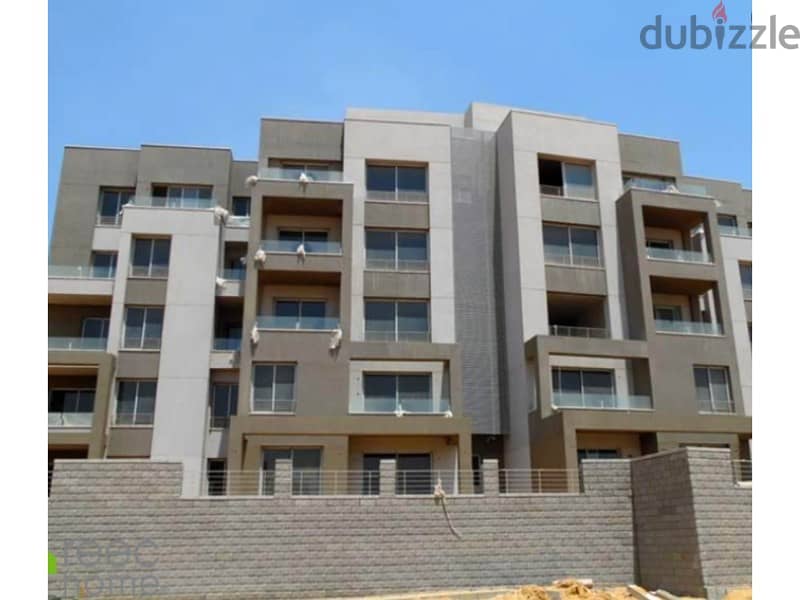 Apartment with private garden for sale, ready to move in installments, in the heart of New Cairo 7