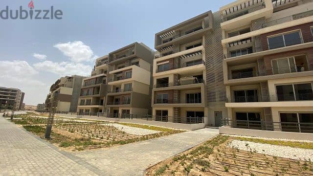 An apartment for sale in installments, in a prime location, ready to move in, with the largest open view and landscape 6