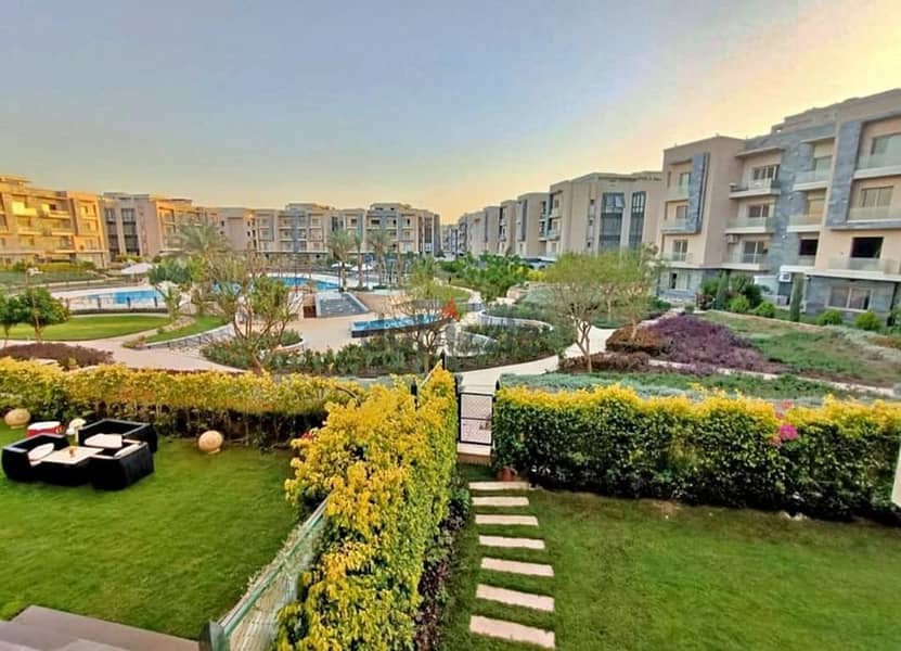 apartment for sale  In a garden in Trio Gardens Compound, Fifth Settlement 2