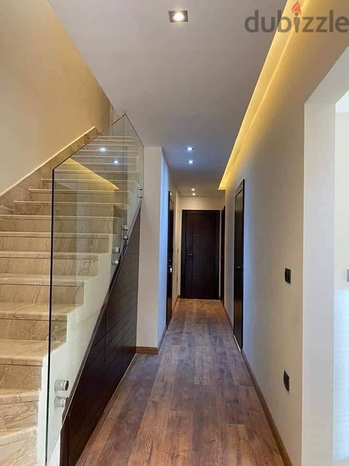 penthouse 4bedrooms for sale in new cairo , on ring road behind mergae city compound , down payment 1,800,000 over 8 years 1