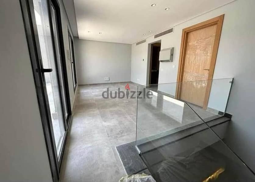penthouse 4bedrooms for sale in new cairo , on ring road behind mergae city compound , down payment 1,800,000 over 8 years 9