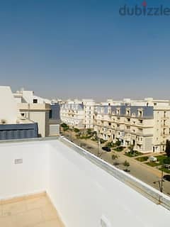 I-Villa Roof Corner 4rooms for sale in New Cairo, aliva Mountain View Compound, Mostakbal City, installments over 9 years, direct view on  lagoons 12