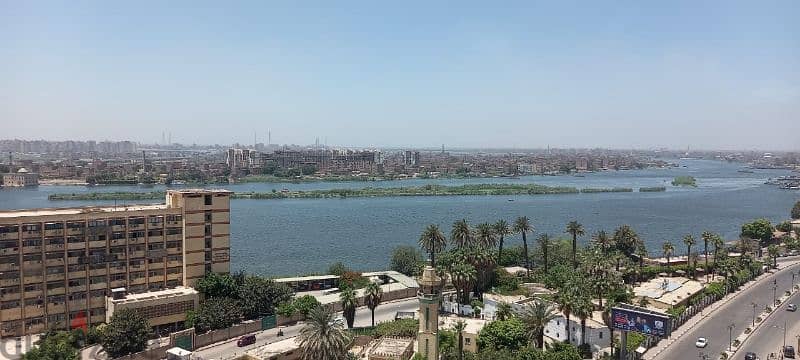 شقة و روف علي النيل صف اول  ٤٠٠ متر  امام كوبري تحيا مصر المظلات 1