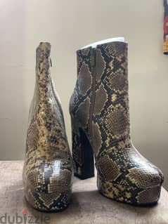 Ankle boots in serpent print