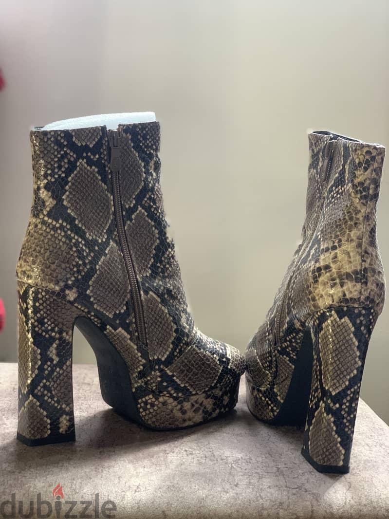 Ankle boots in serpent print 1