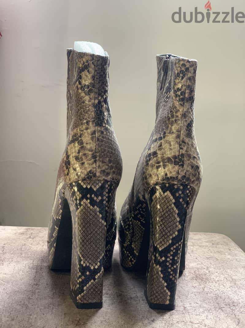 Ankle boots in serpent print 2