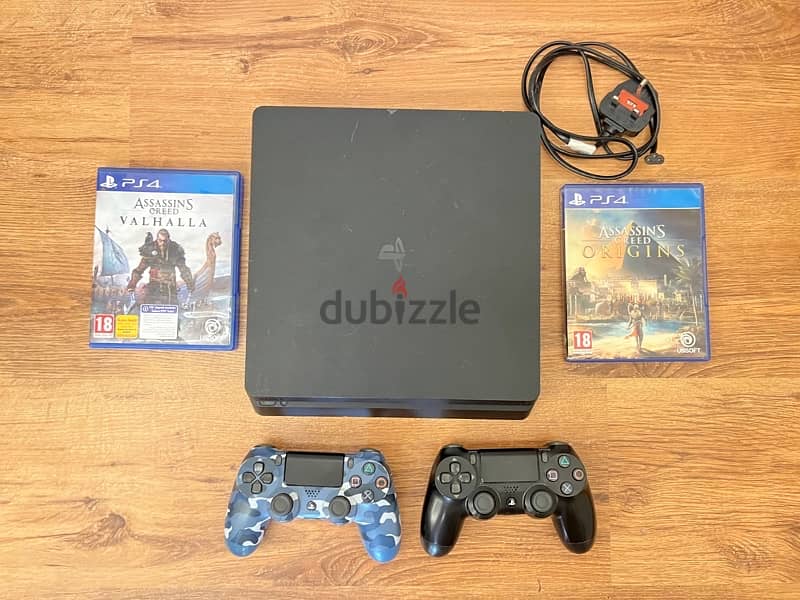 playstation4 with 2 orginal controllers and 2 games 2