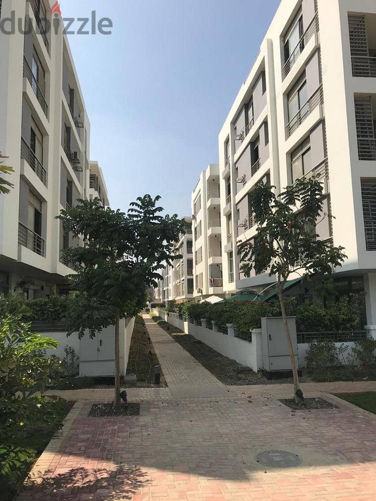 130 sqm ground floor apartment with a distinctive nautical garden overlooking green spaces in Taj City Compound, new Cairo Taj City 3