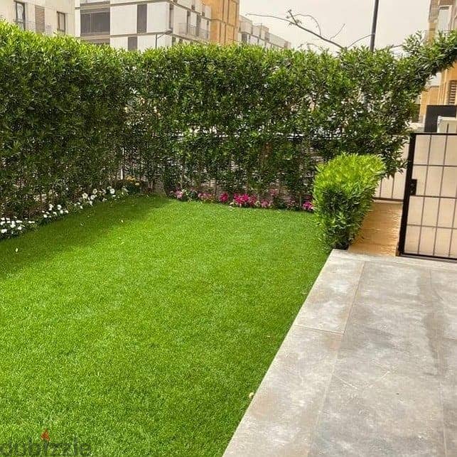 130 sqm ground floor apartment with a distinctive nautical garden overlooking green spaces in Taj City Compound, new Cairo Taj City 5