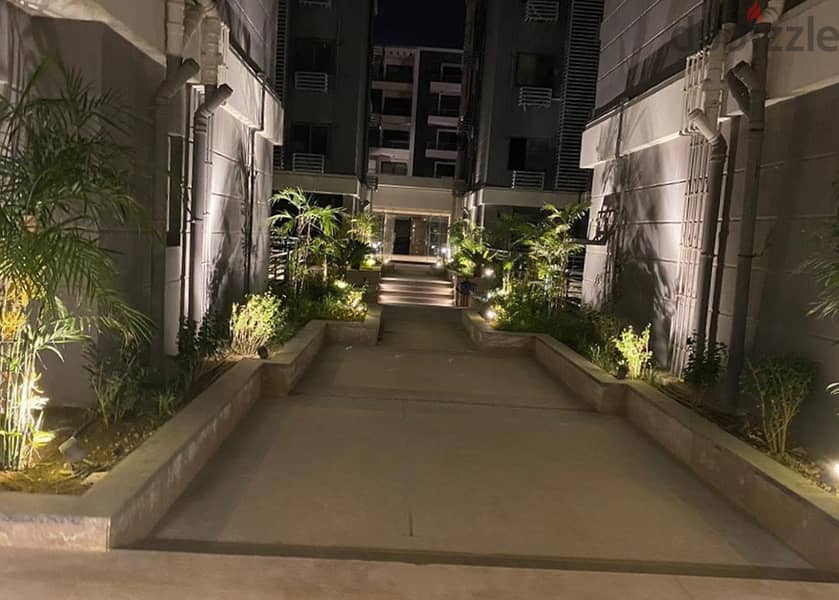 Corner apartment for sale, 3 rooms, Taj City, New Cairo, in front of Cairo International Airport, in installments over 8 years, with a 70% discount 22